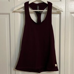 Vuori Lux Racerback Tank Top in eggplant/plum color
